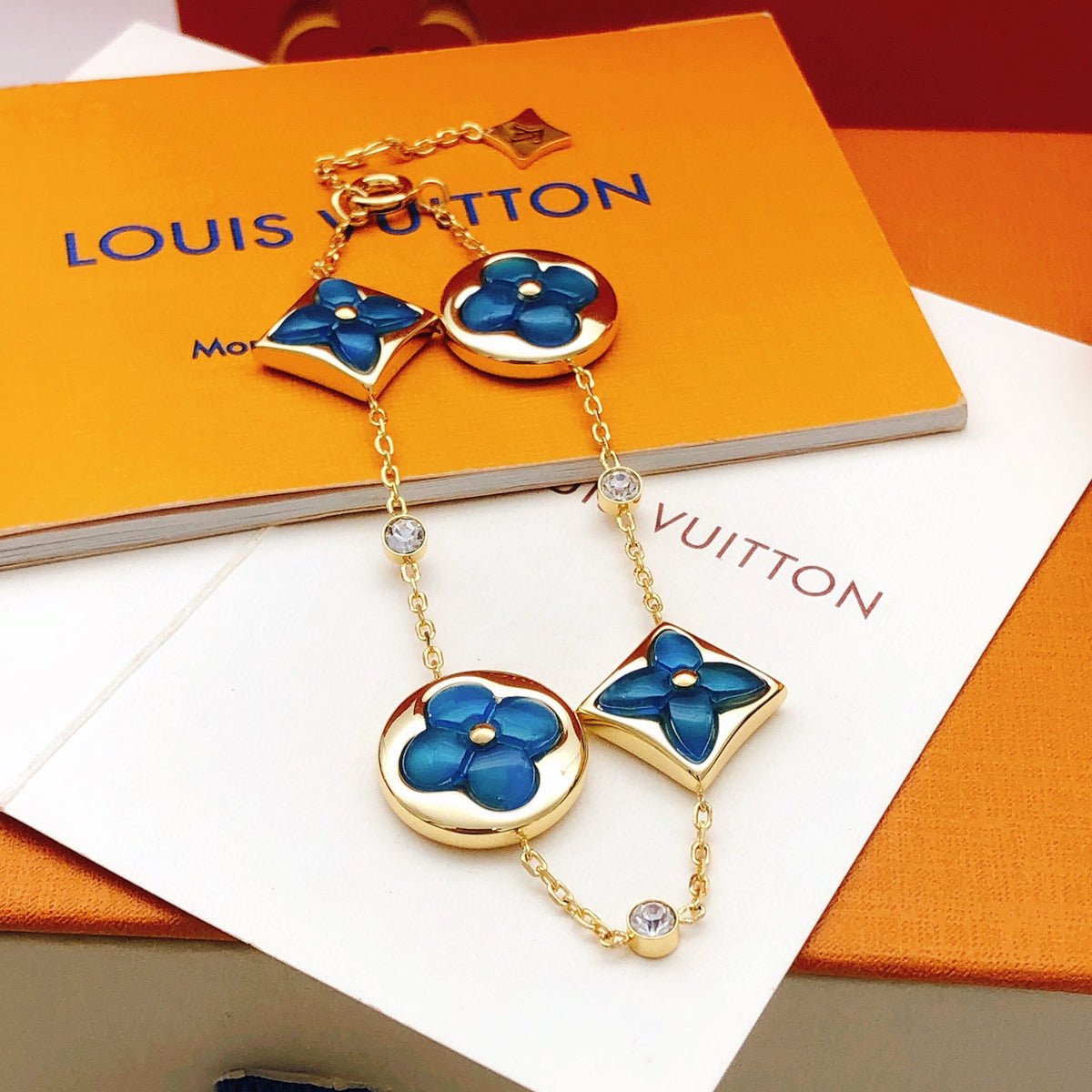 Geometric Emblem Bracelet in Gold-Tone – Blue Detail – Design 003 front product view