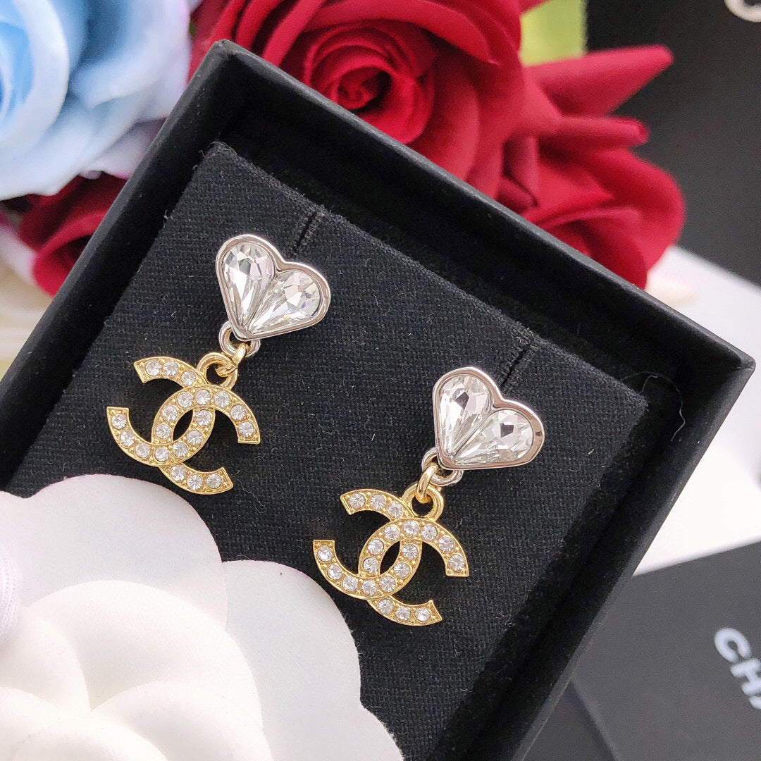 Double-C Emblem Jewelry Accessory in Gold-Tone – Heart Detail front product view