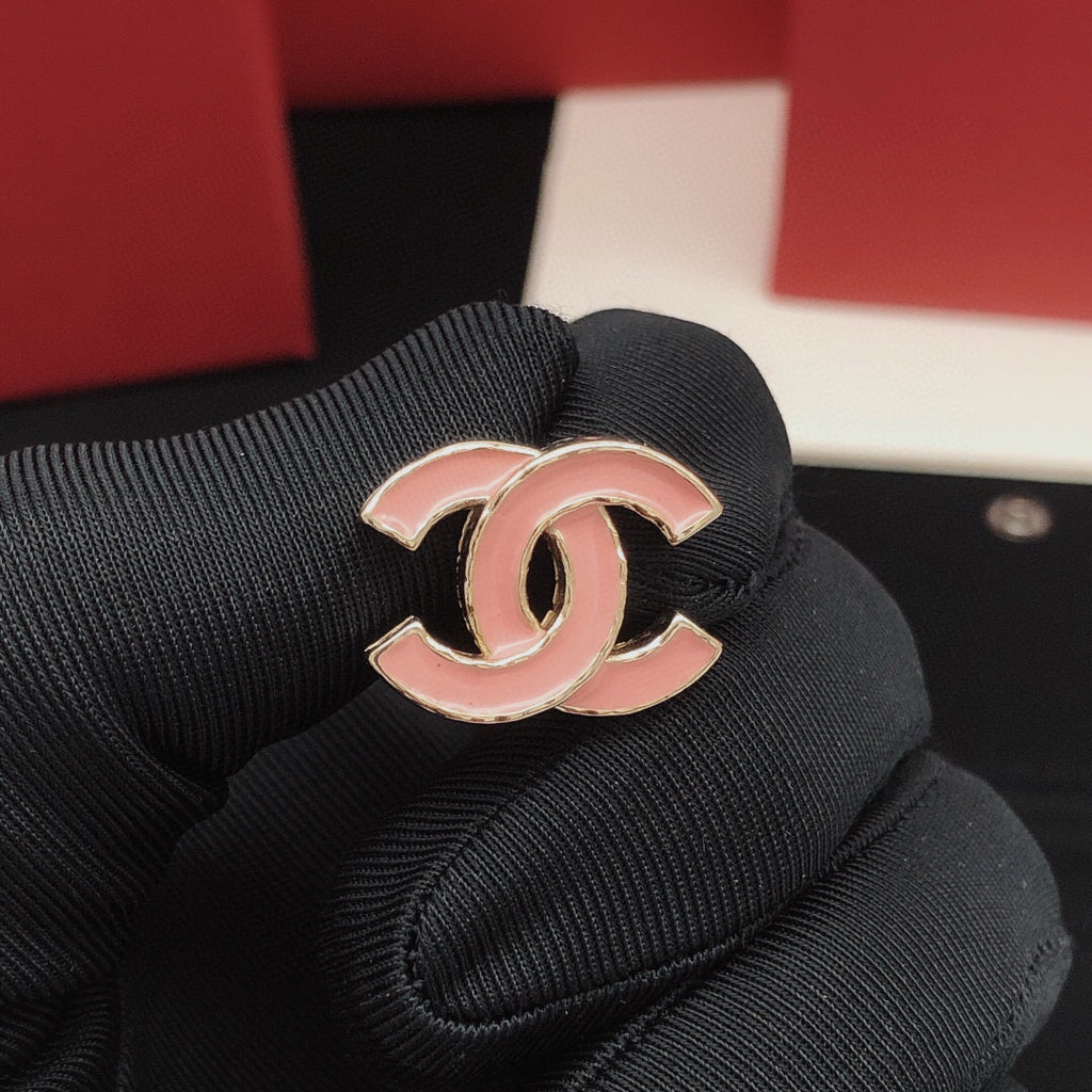 Signature Emblem Stud Earrings in Gold-Tone – Pink Detail detail view