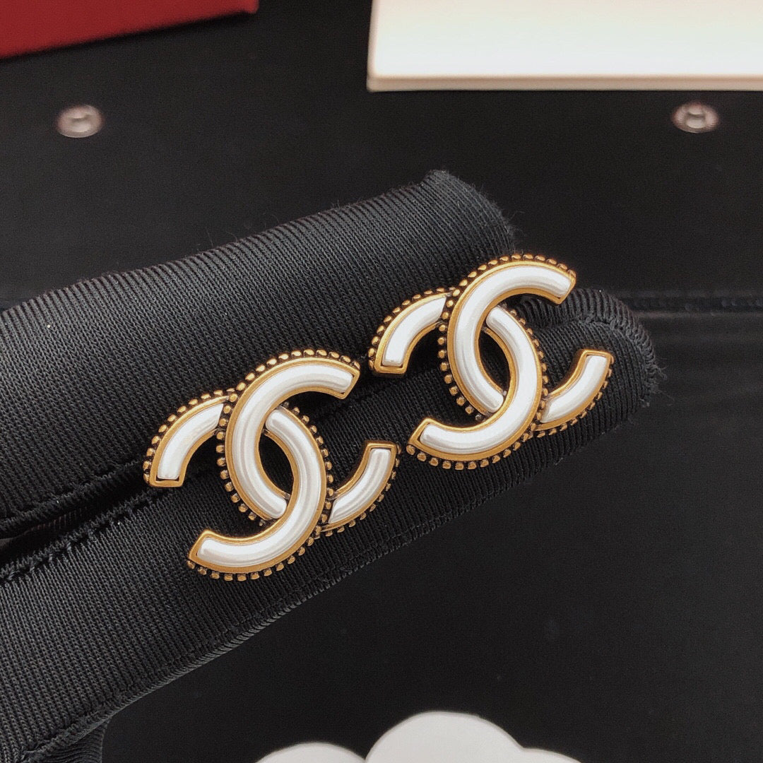 Double-C Emblem Stud Earrings in Gold-Tone – White Detail styled product view