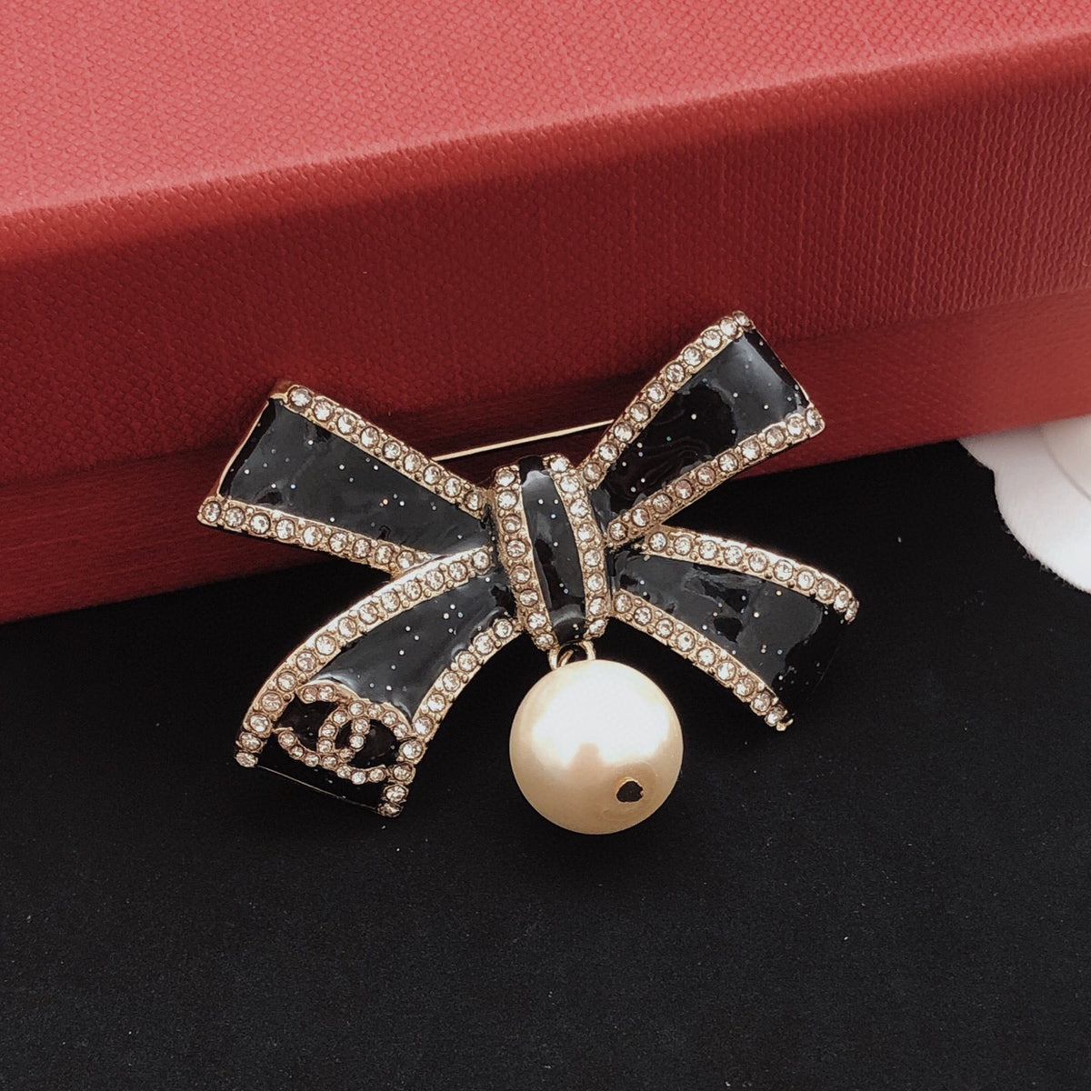 Bow Brooch in Gold-Tone – Black Detail styled product view