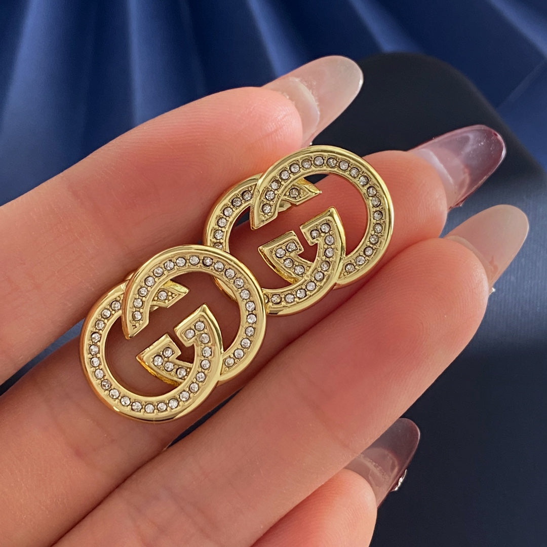 Double-G Emblem Brooch in Gold-Tone – Crystal Detail styled product view