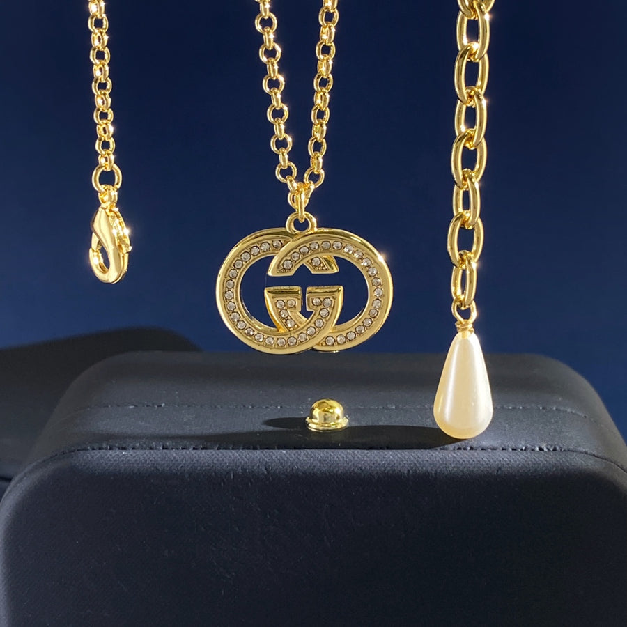 Double-G Emblem Brooch in Gold-Tone – Crystal Detail – Design 004 main product view