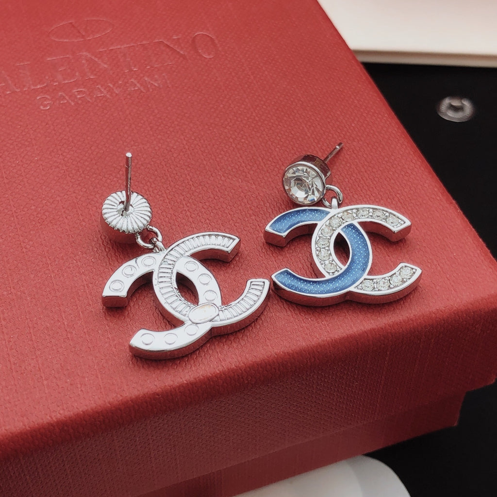 Signature Emblem Stud Earrings in Gold-Tone – Blue Detail close-up detail