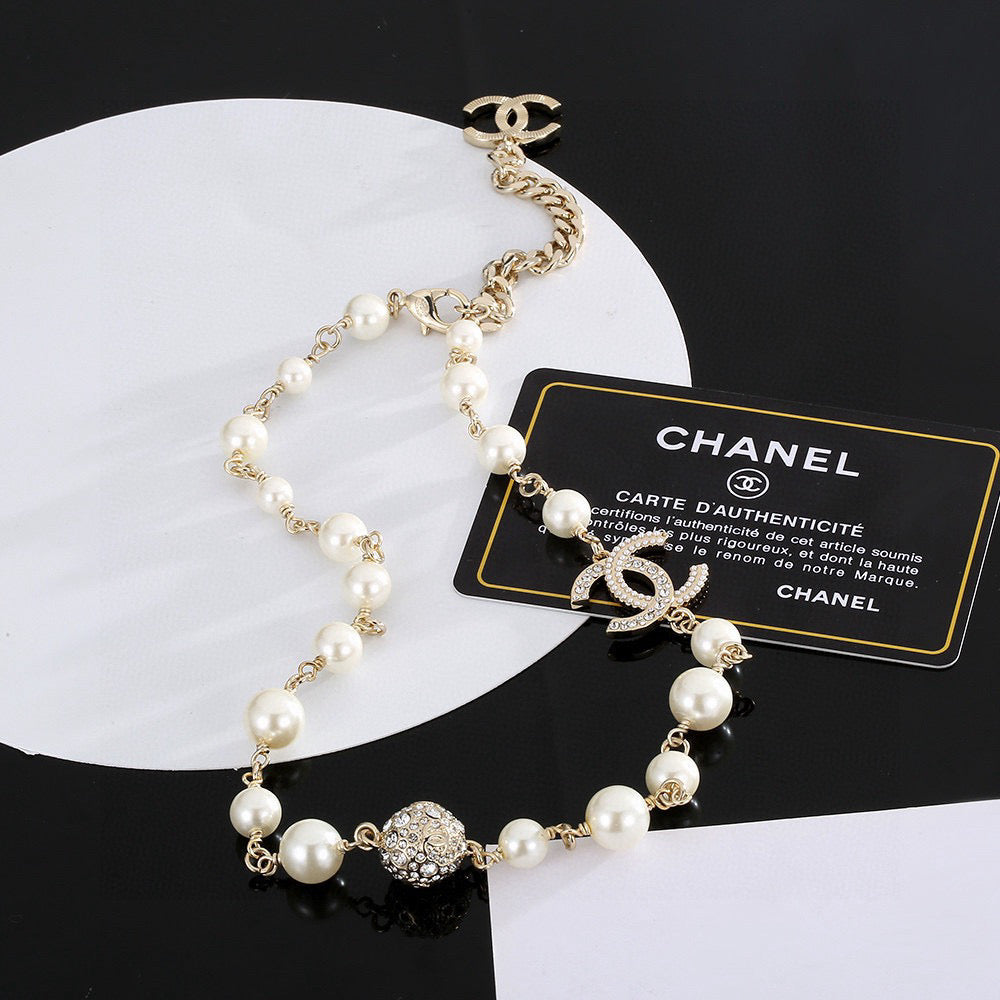 Double-C Emblem Pearl-Detail Pendant Necklace – Pearl Detail – Design 058 detail view