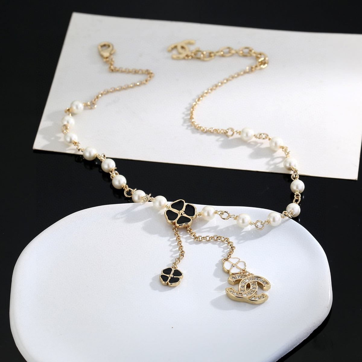 Double-C Emblem Pearl-Detail Pendant Necklace – Pearl Detail – Design 057 close-up detail