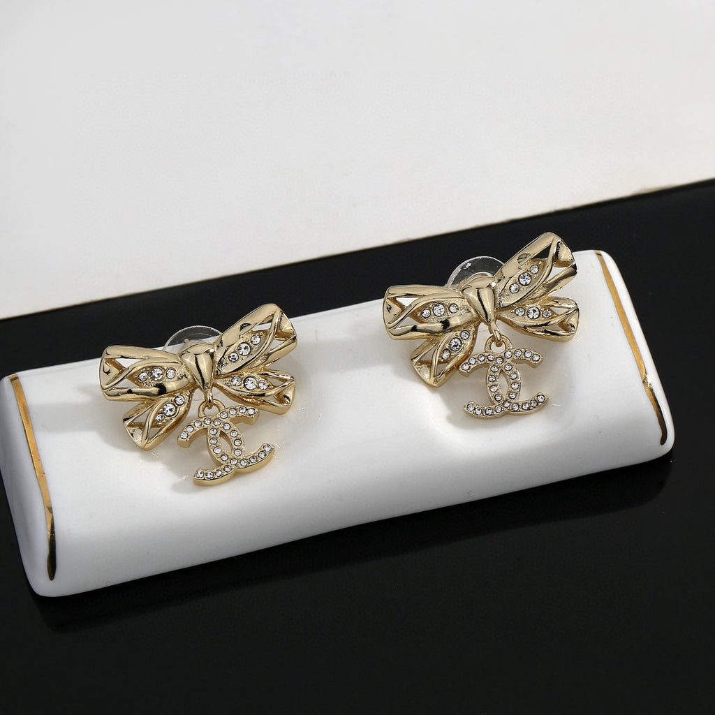 Double-C Emblem Stud Earrings in Polished Metal-Tone – Design 185 styled product view