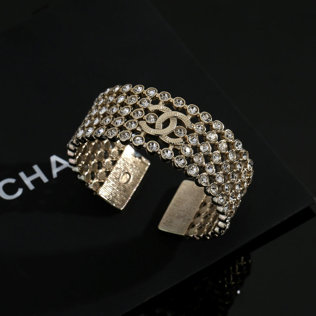 Signature Emblem Bangle in Polished Metal-Tone – Design 018 front product view