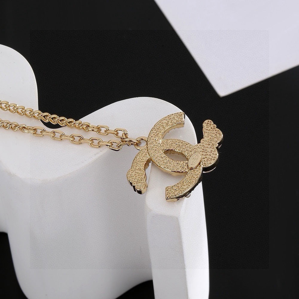 Double-C Emblem Pearl-Detail Pendant Necklace – Pearl Detail – Design 041 styled product view