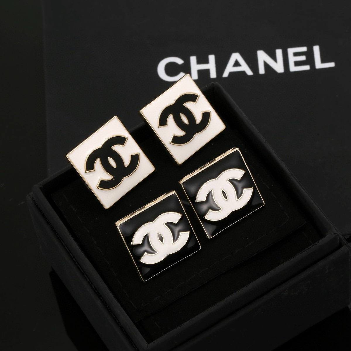 Double-C Emblem Stud Earrings in Gold-Tone – Design 015 detail view