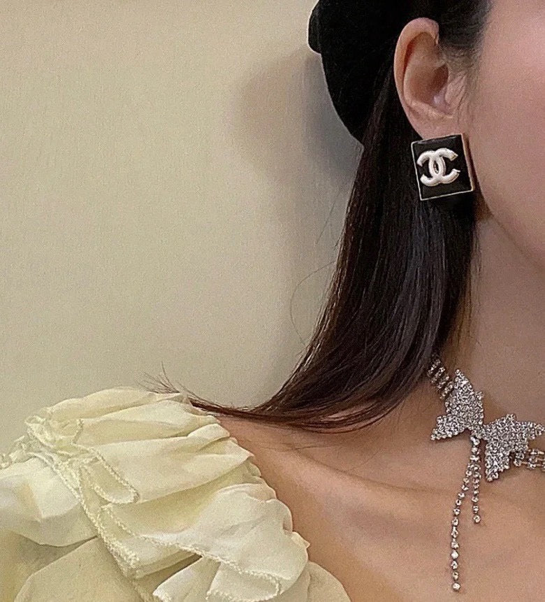 Double-C Emblem Stud Earrings in Gold-Tone – Design 015 front product view