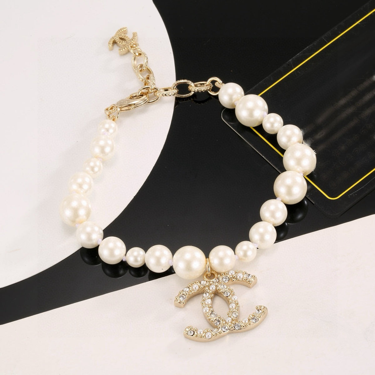 Double-C Emblem Bracelet in Gold-Tone – Pearl Detail – Design 003 close-up detail