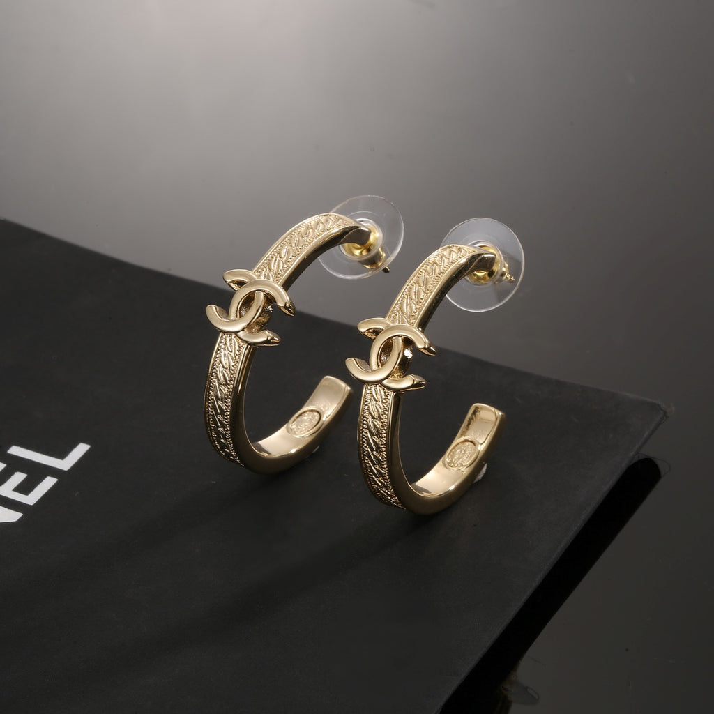 Signature Emblem Stud Earrings in Polished Metal-Tone – Design 018 main product view