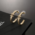 Signature Emblem Stud Earrings in Polished Metal-Tone – Design 018 main product view