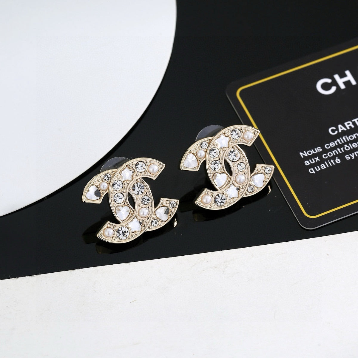 Double-C Emblem Stud Earrings in Gold-Tone – Star Detail – Design 004 main product view