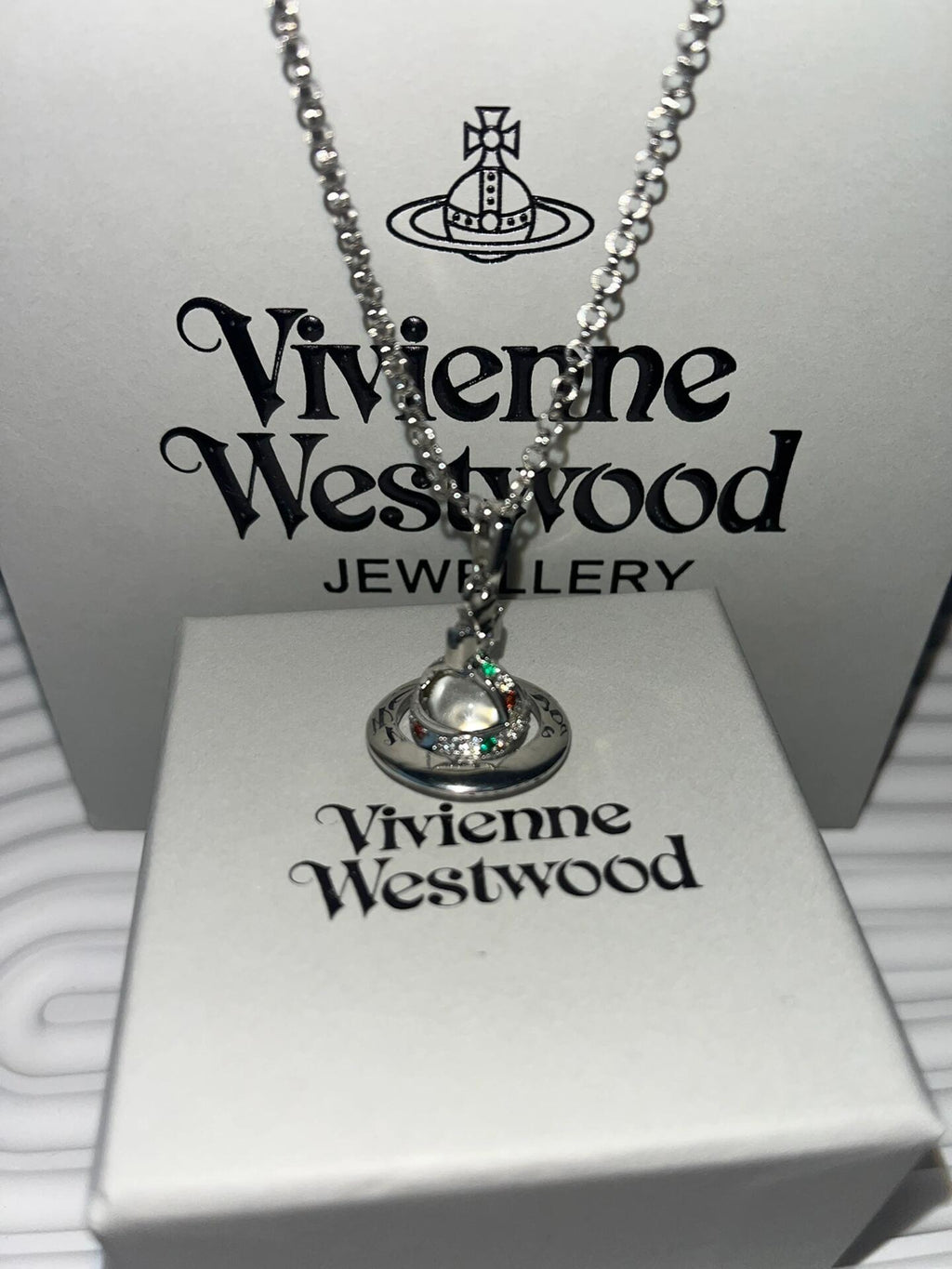 Vivienne Westwood Orb-Inspired Emblem Jewelry Accessory in Polished Metal-Tone – Design 008 close-up detail