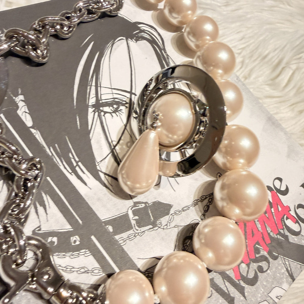 Orb-Inspired Emblem Jewelry Accessory in Polished Metal-Tone – Design 001 detail view