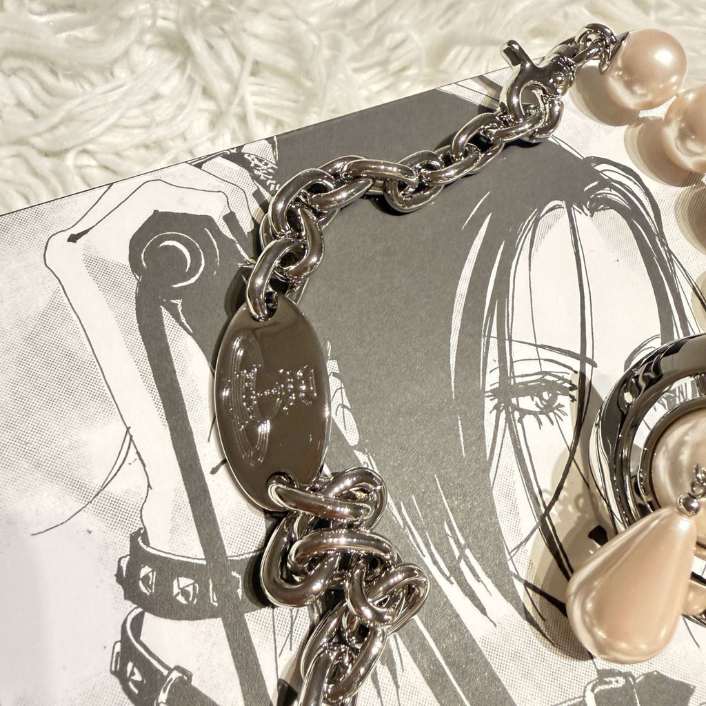 Orb-Inspired Emblem Jewelry Accessory in Polished Metal-Tone – Design 001 main product view