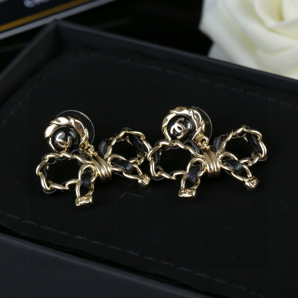 Bow Statement Earrings in Polished Metal-Tone – Design 001 detail view