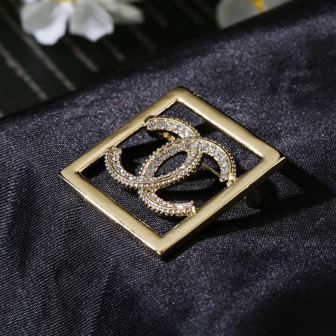 Double-C Emblem Brooch in Polished Metal-Tone – Design 057 styled product view