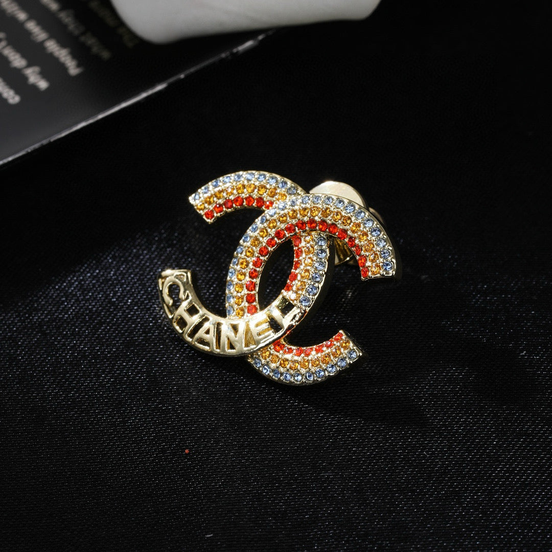 Double-C Emblem Brooch in Polished Metal-Tone – Design 056 detail view