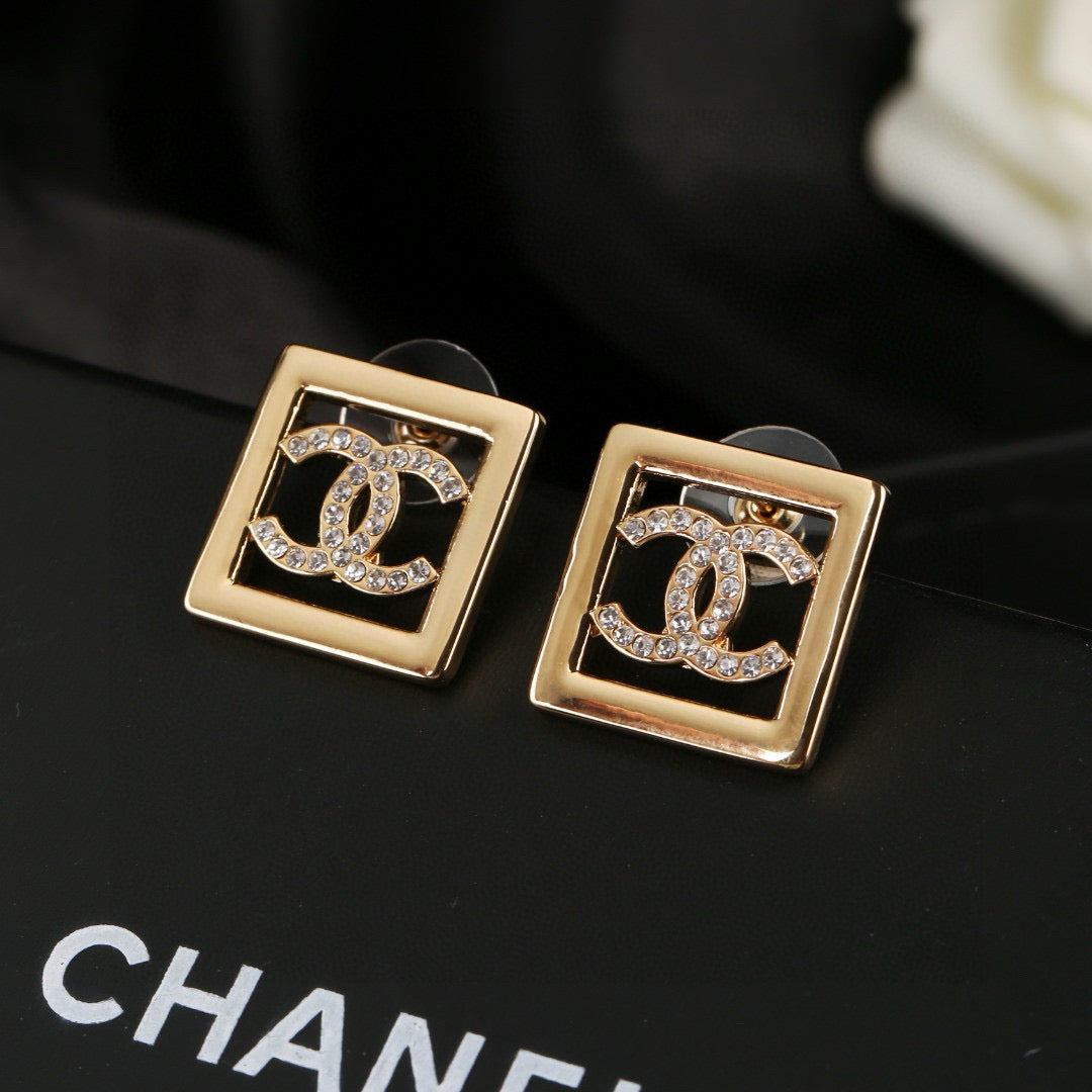 Double-C Emblem Stud Earrings in Gold-Tone – Design 018 detail view