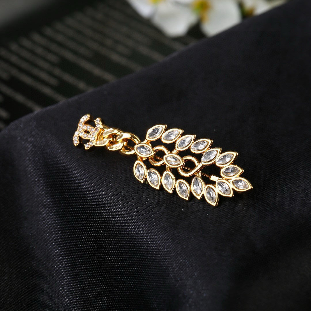 Double-C Emblem Brooch in Polished Metal-Tone – Design 058 styled product view