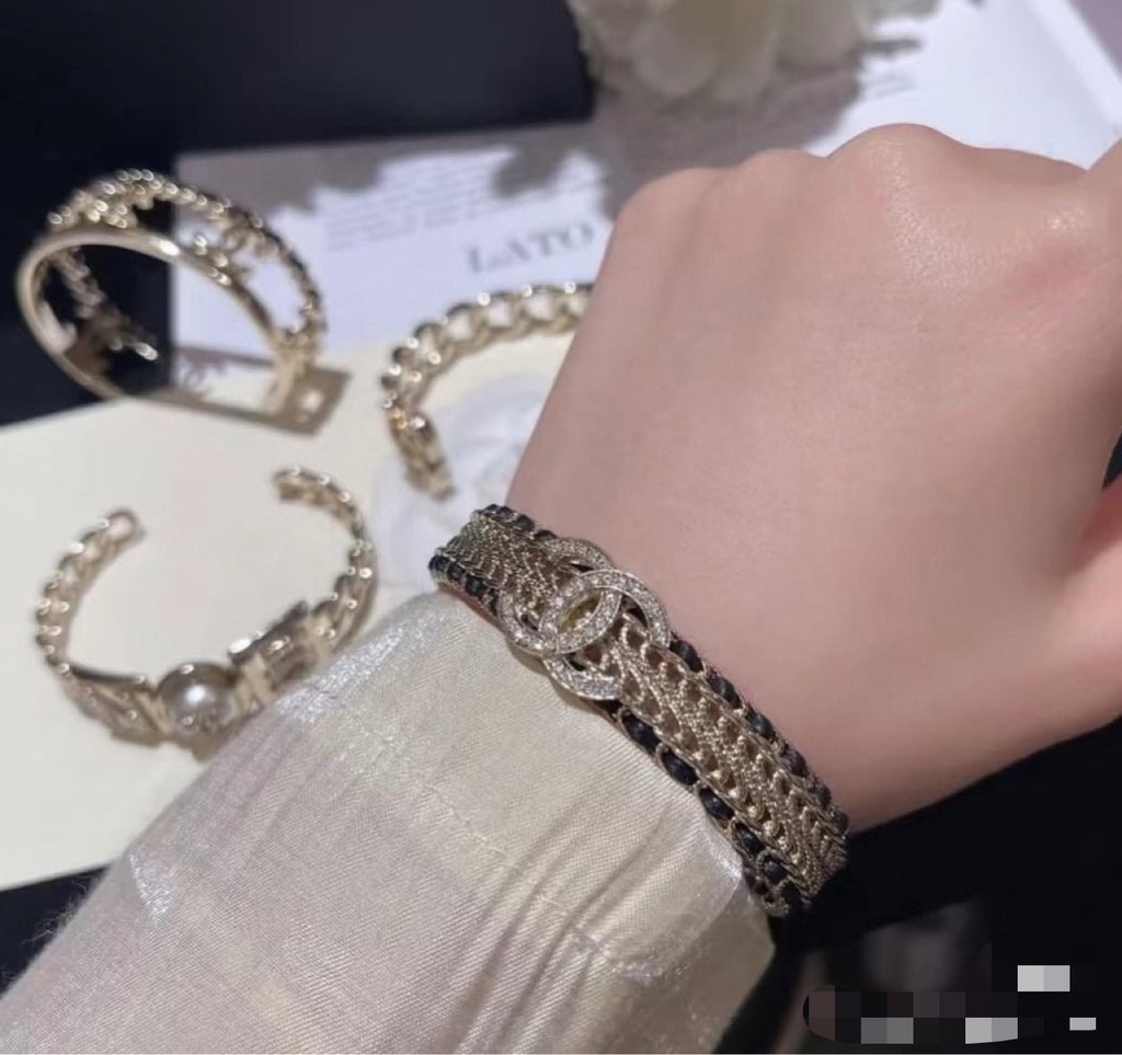 Signature Emblem Bangle in Polished Metal-Tone – Black Detail – Design 006 detail view
