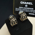 Double-C Emblem Stud Earrings in Gold-Tone – Black Detail – Design 002 main product view