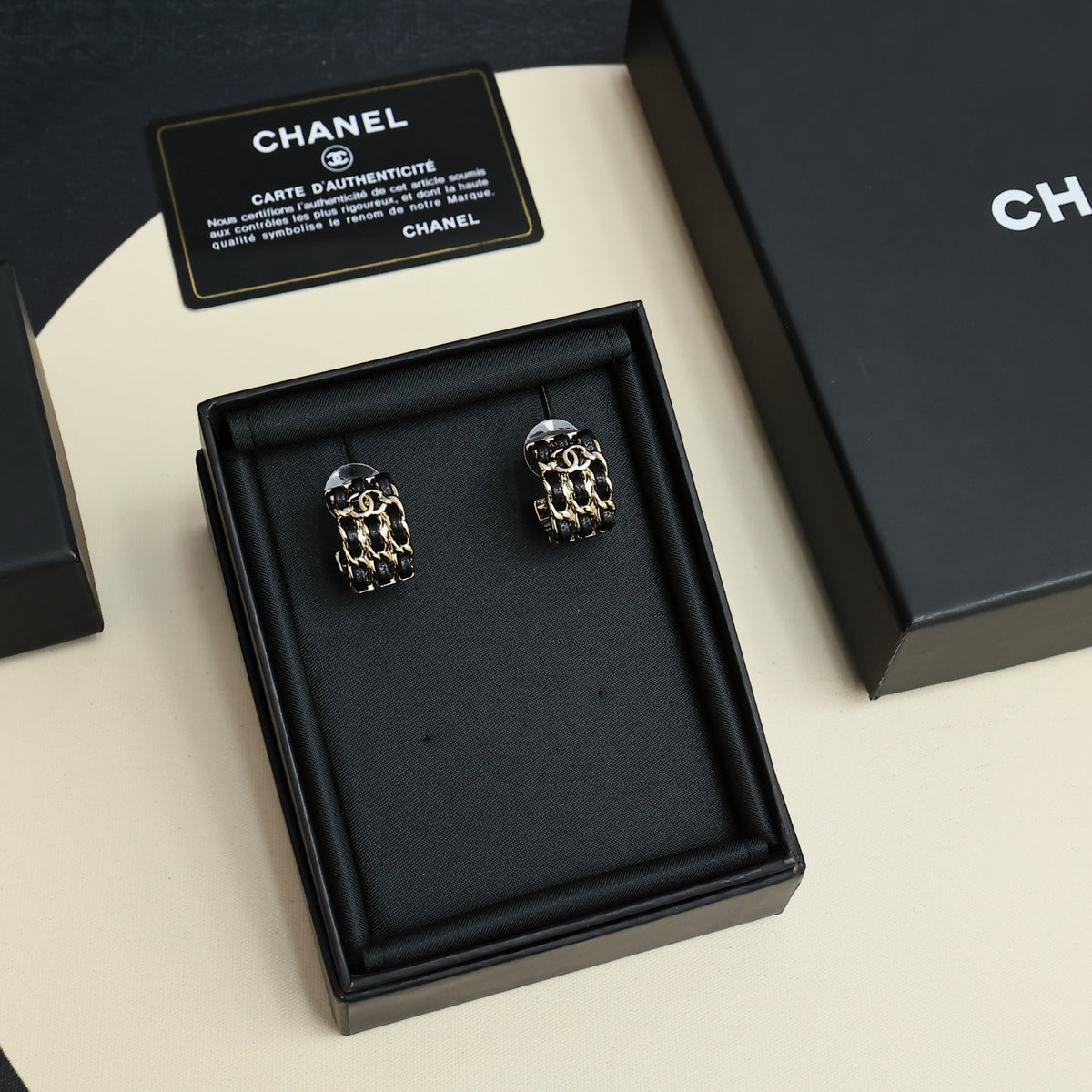 Double-C Emblem Stud Earrings in Gold-Tone – Black Detail – Design 002 front product view