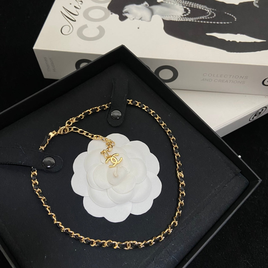 Double-C Emblem Pendant Necklace in Polished Metal-Tone – Black Detail – Design 002 front product view