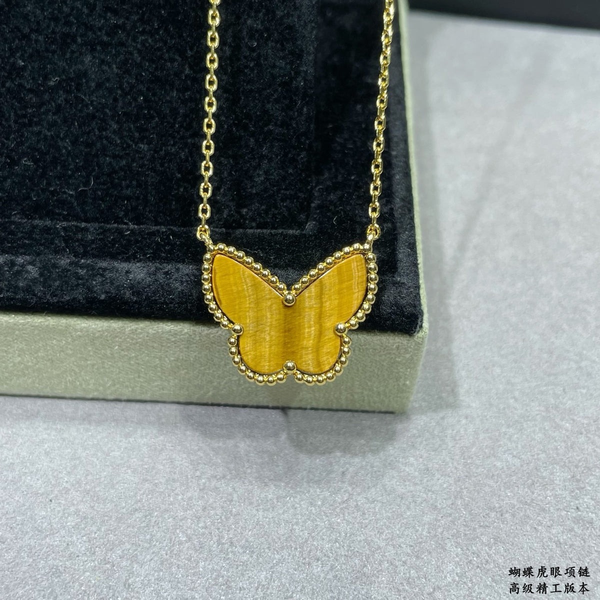 Butterfly Pendant Necklace in Polished Metal-Tone – Tiger-Eye front product view