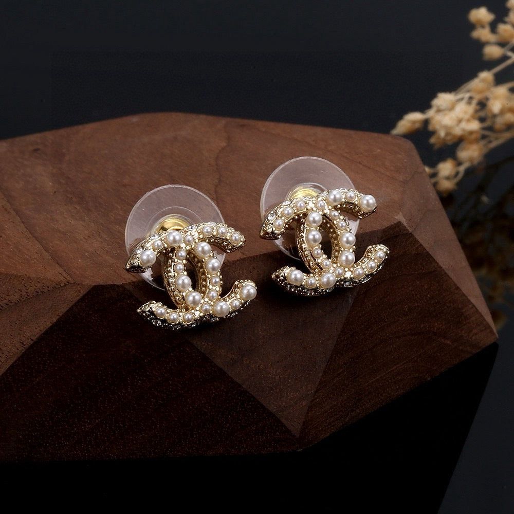 Signature Emblem Stud Earrings in Silver-Tone – Design 016 close-up detail