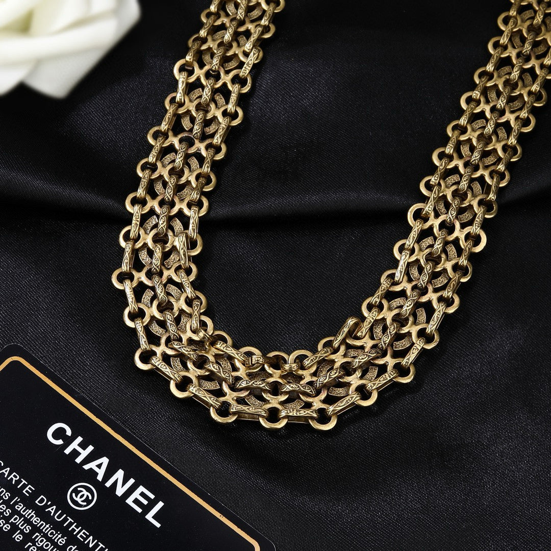 Signature Emblem Jewelry Accessory in Gold-Tone – Design 001 close-up detail