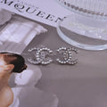 Signature Emblem Stud Earrings in Polished Metal-Tone – Design 031 main product view