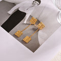 Signature Emblem Stud Earrings in Polished Metal-Tone – Design 030 main product view