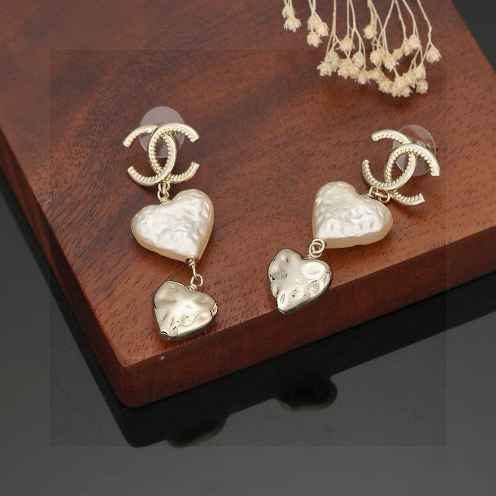 Signature Emblem Stud Earrings in Gold-Tone – Design 007 styled product view