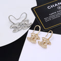Signature Emblem Stud Earrings in Polished Metal-Tone – Design 007 main product view