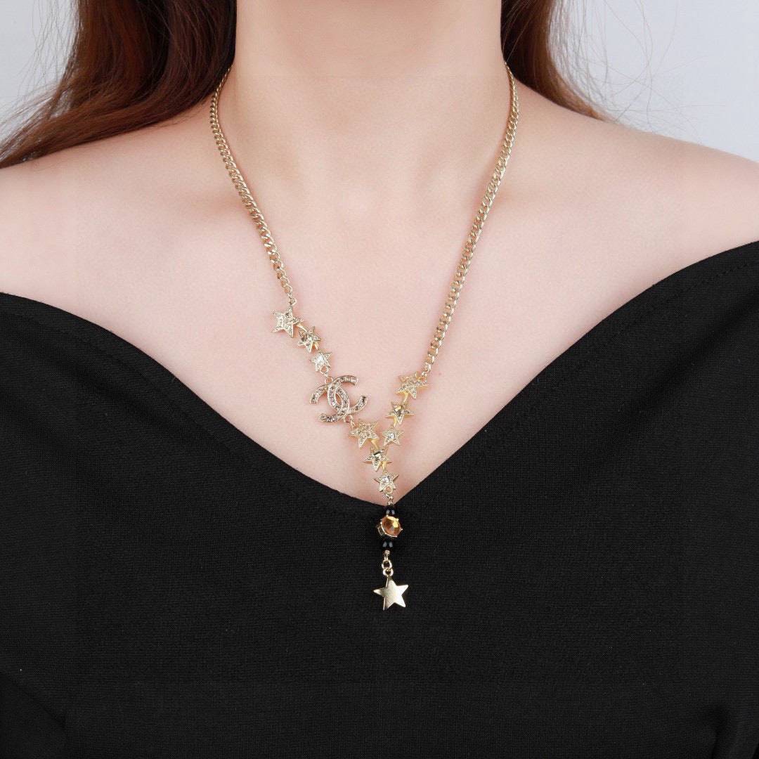 Signature Emblem Pendant Necklace in Polished Metal-Tone – White Detail front product view
