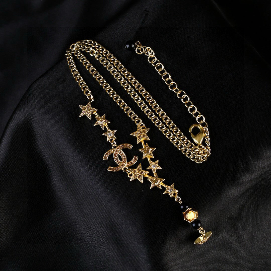 Signature Emblem Pendant Necklace in Polished Metal-Tone – White Detail main product view
