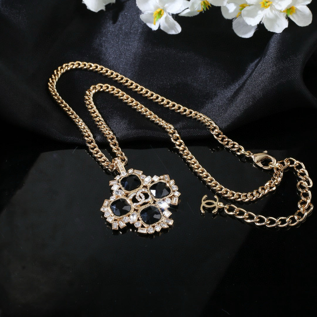 Double-C Emblem Pendant Necklace in Gold-Tone – Design 002 close-up detail