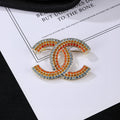 Double-C Emblem Brooch in Polished Metal-Tone – Design 013 main product view