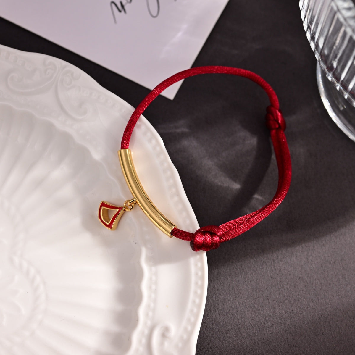 Red Cord Braided Bracelet in Polished Metal-Tone – Red Cord Detail styled product view