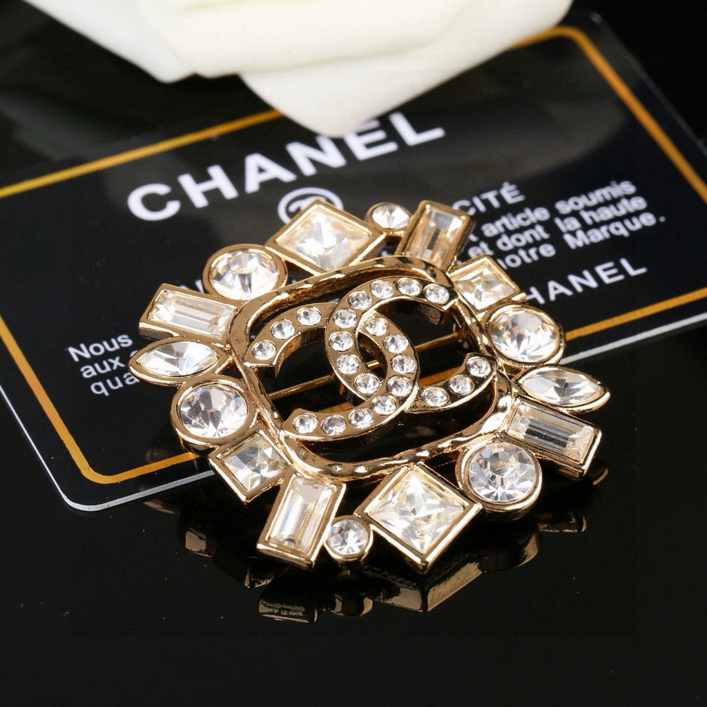 Double-C Emblem Brooch in Polished Metal-Tone – Design 016 detail view
