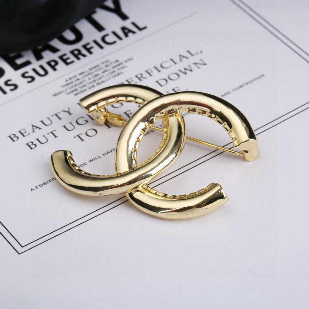 Signature Emblem Brooch in Polished Metal-Tone – Design 008 front product view