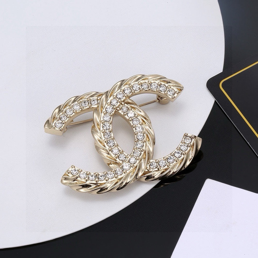Signature Emblem Brooch in Polished Metal-Tone – Design 017 front product view