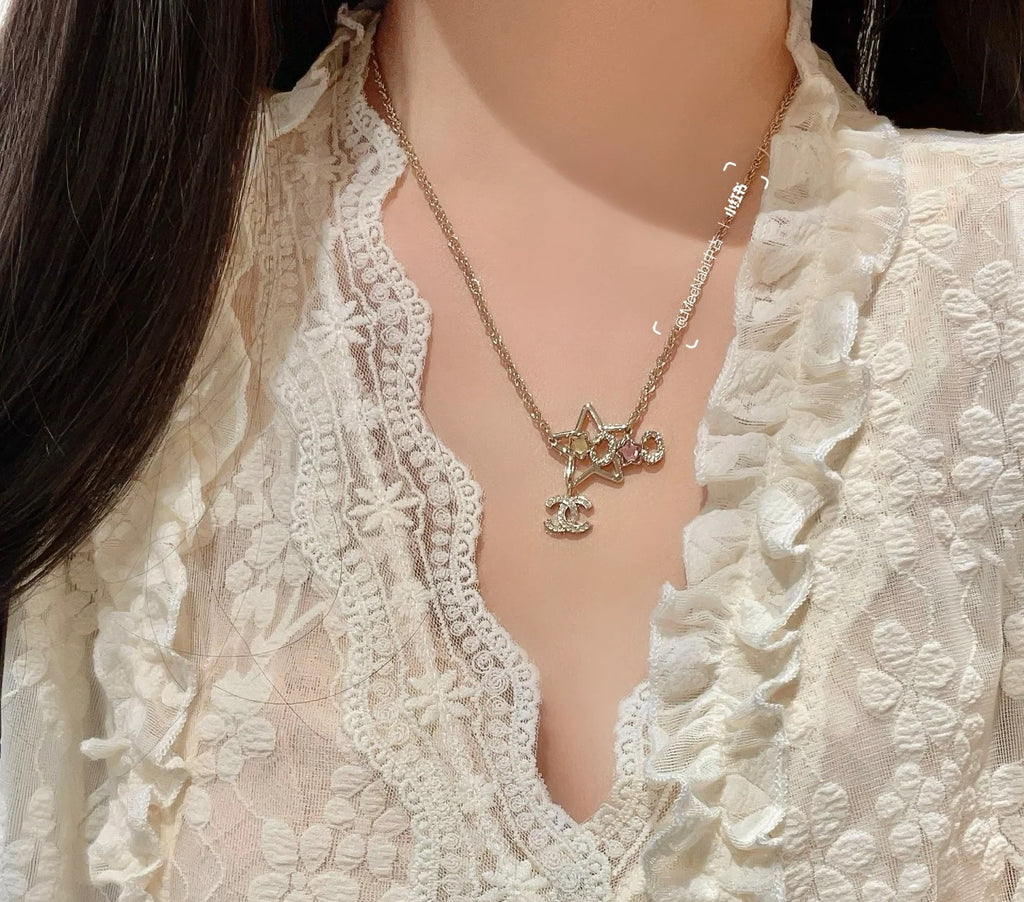 Double-C Emblem Crystal-Accent Pendant Necklace – Star Detail styled product view
