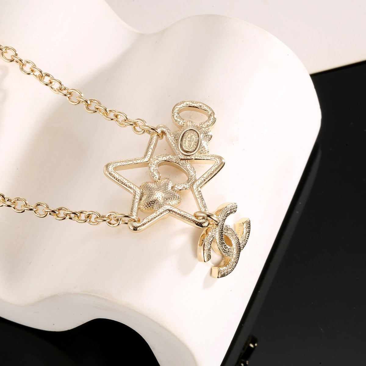 Double-C Emblem Crystal-Accent Pendant Necklace – Star Detail detail view