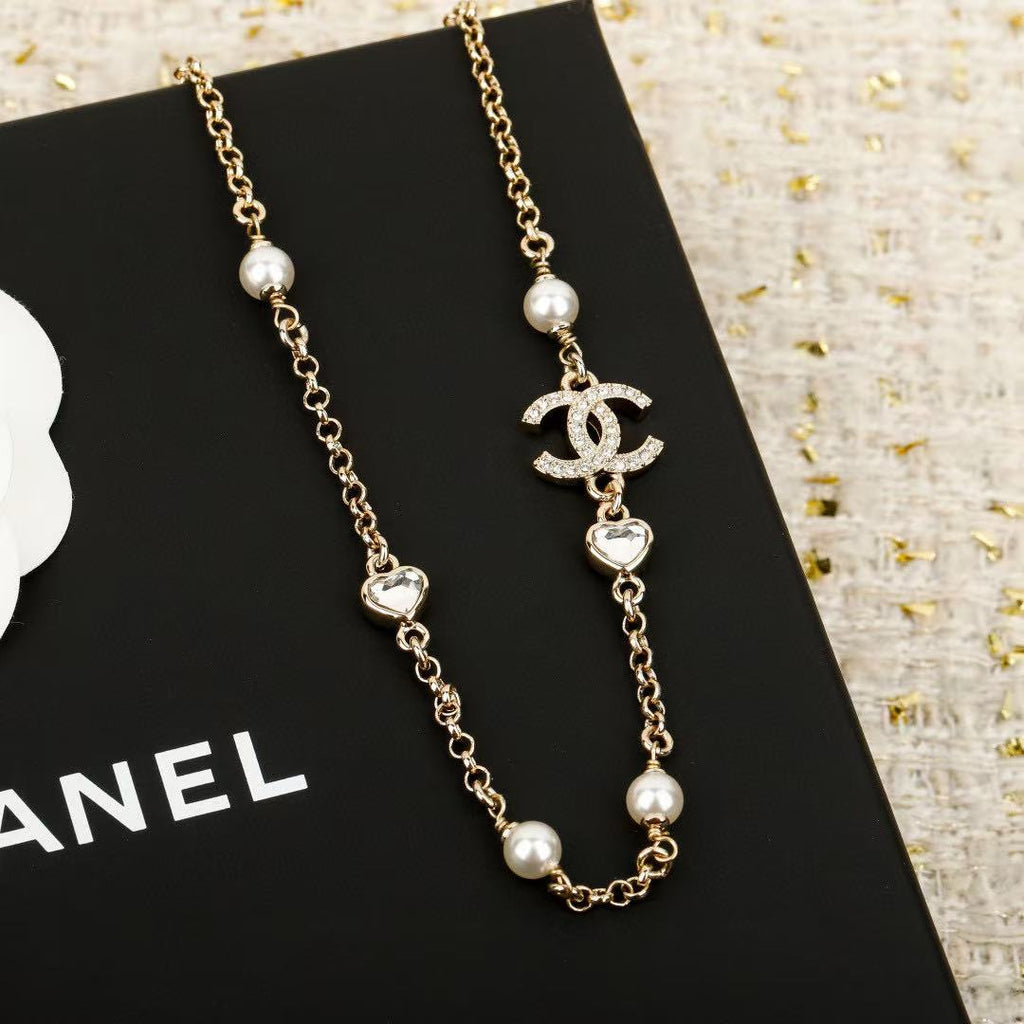 Double-C Emblem Pendant Necklace in Polished Metal-Tone – Design 014 close-up detail