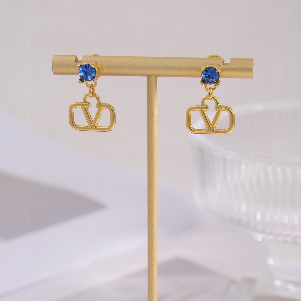 Signature Emblem Stud Earrings in Gold-Tone – Design 04 detail view